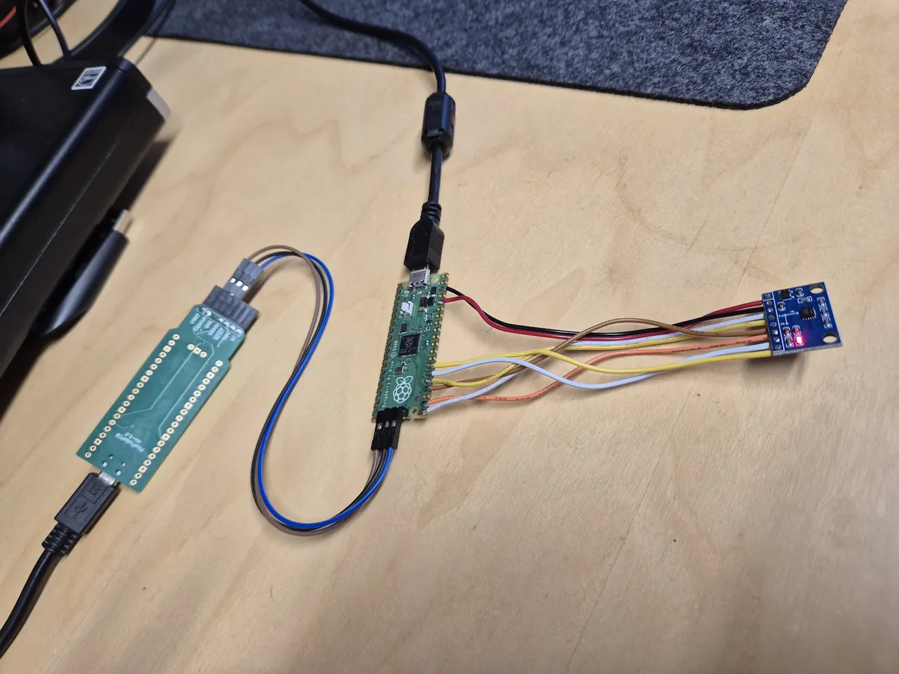 The ICM-42688-P breakout board wired to a Raspberry Pi Pico over SPI